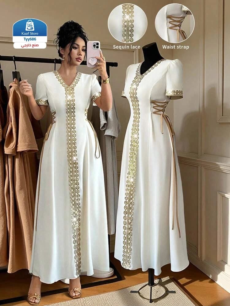 فستان أوف وايت بتطريز ذهبي وربطات جانبية