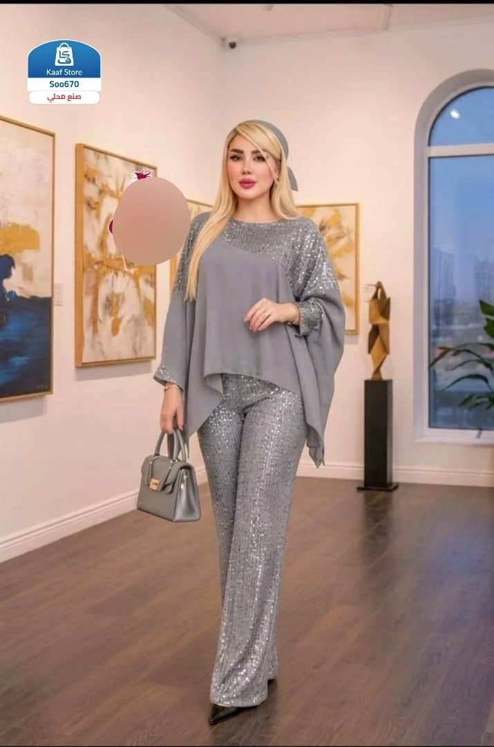 طقم بلوزة وبنطلون نسائي - صورة 1