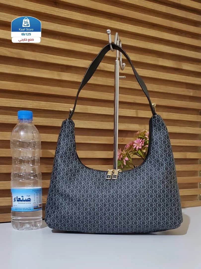 شنطة كتف نسائية بنقشة أنيقة - صورة 1